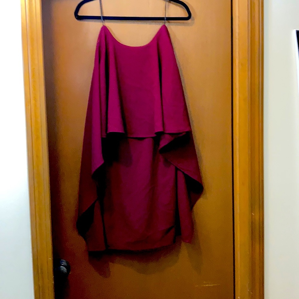 Flowy burgundy dress with open back.